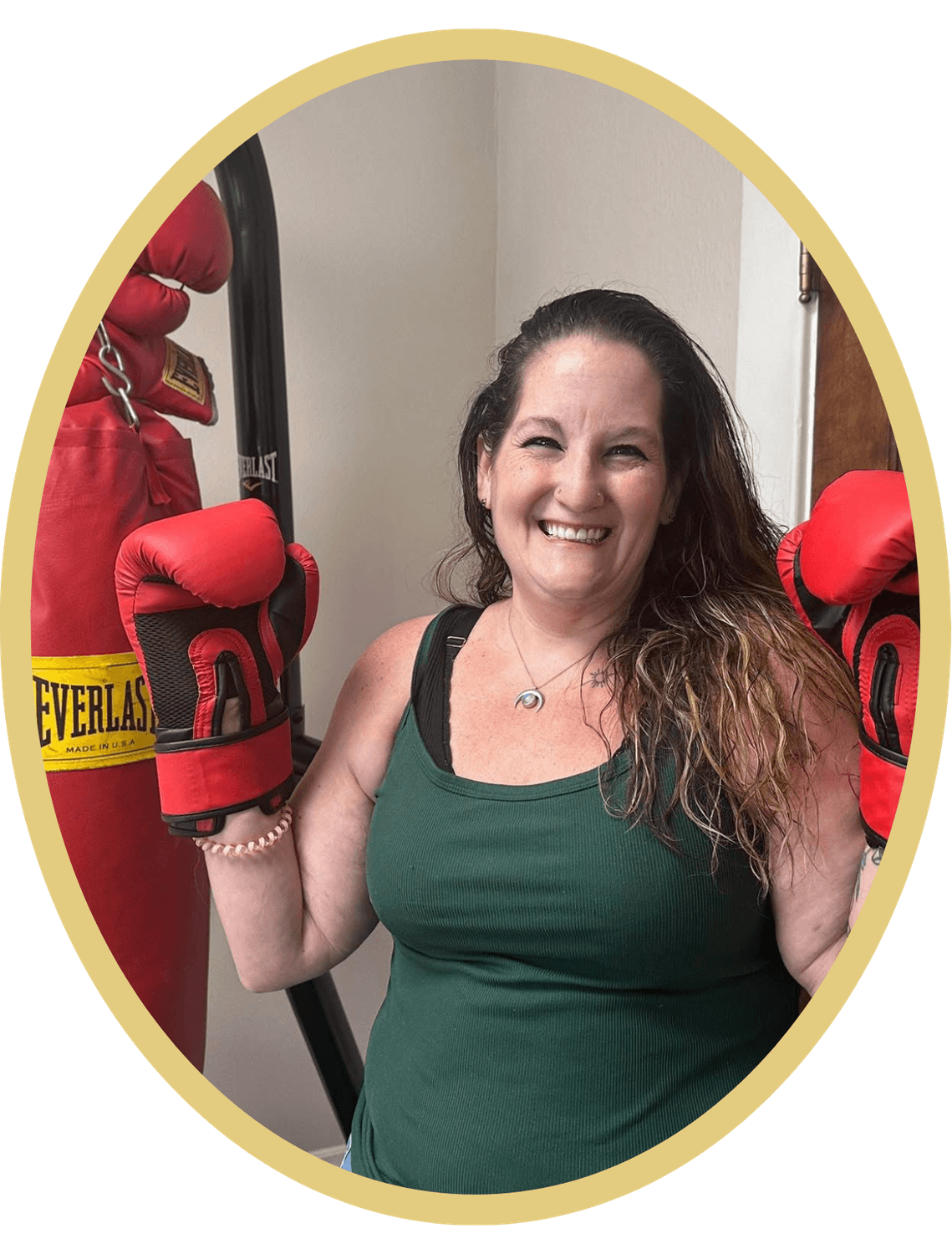 Smiling Tirado Law Office client in red boxing gloves