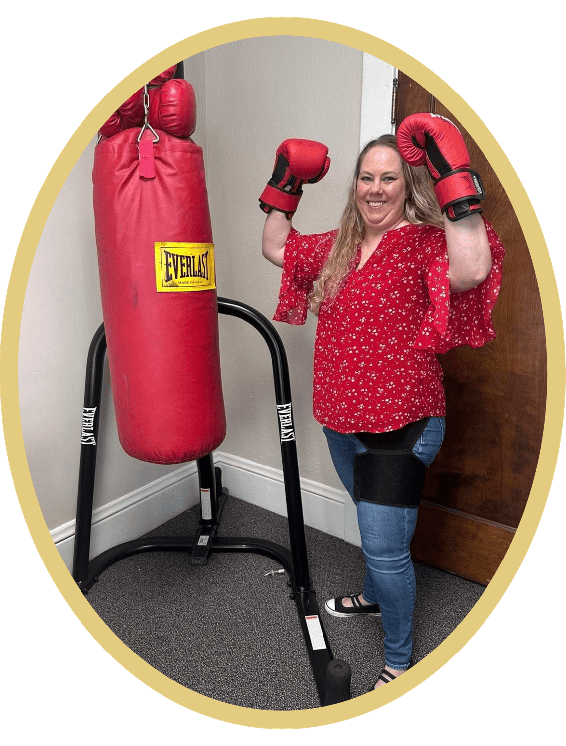 Tirado Law Office client wearing boxing gloves