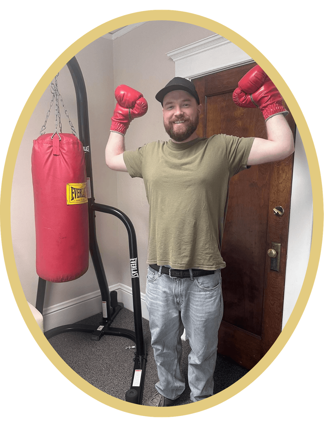 Tirado Law Office client raising boxing gloves in victory