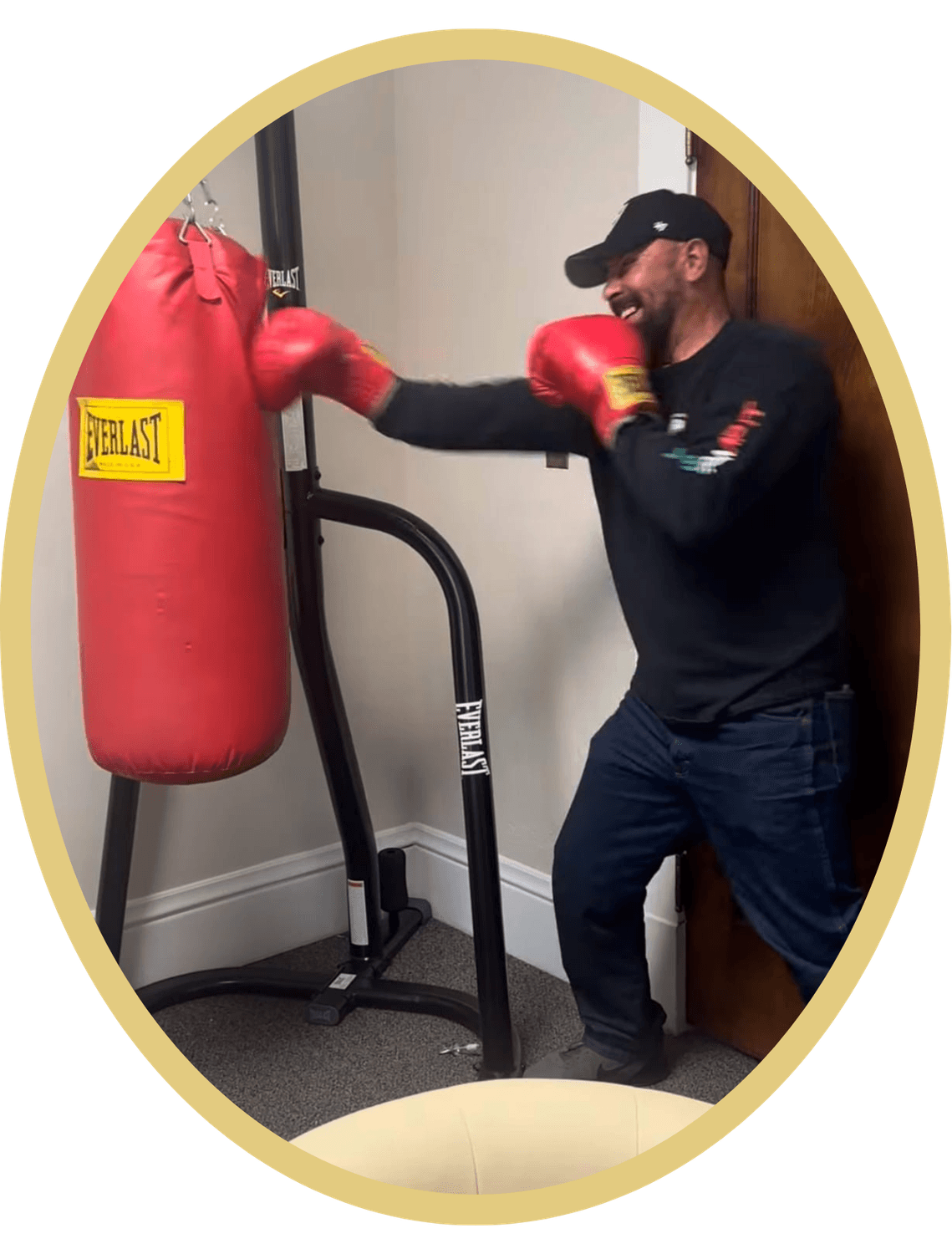 Tirado Law Office client wearing boxing gloves